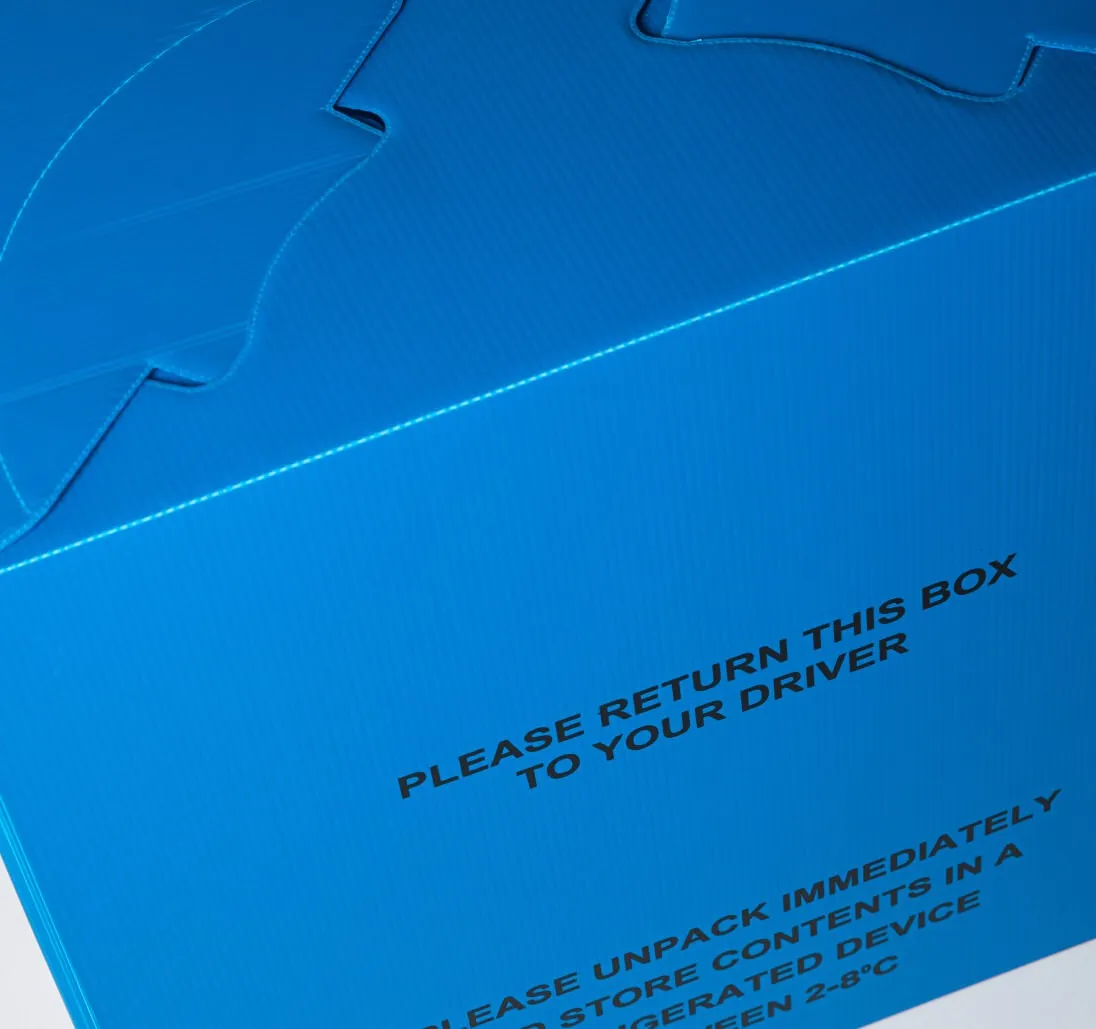 Tri Pack reusable packaging in blue with "This way up" label and "fragile handle with care " logo